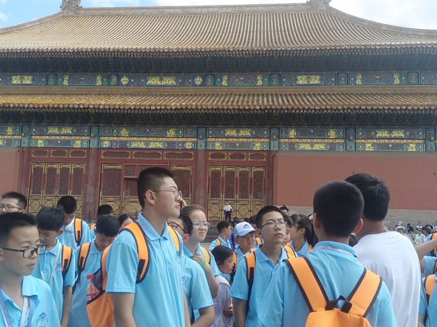 Students walking through the Forbidden City on a school programme