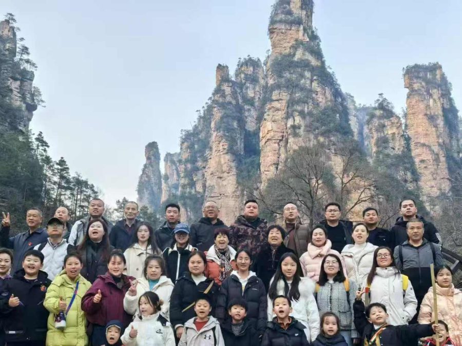 Travellers in front of the sandstone pillars of Zhangjiajie in Hunan