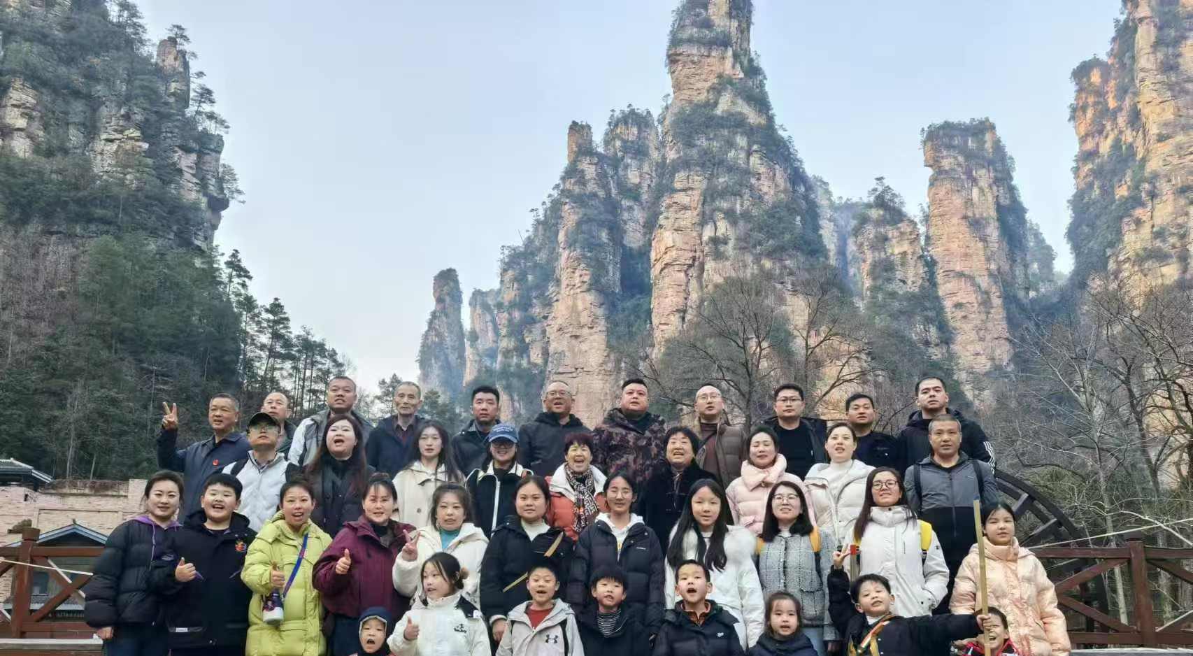 Travellers in front of the sandstone pillars of Zhangjiajie in Hunan
